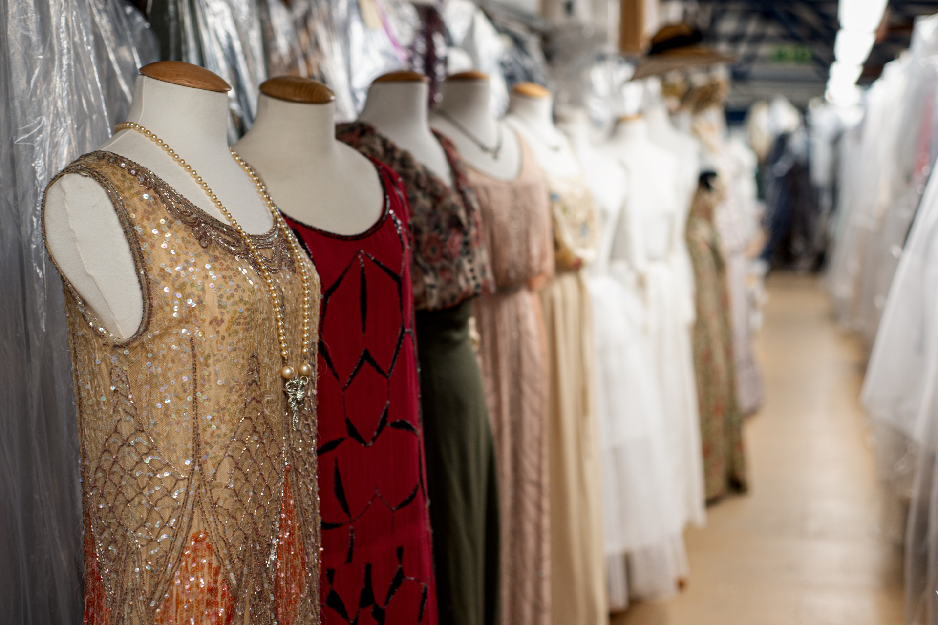 Lines of mannequins wearing period costumes