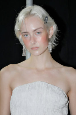 Woman with blonde ripple bob