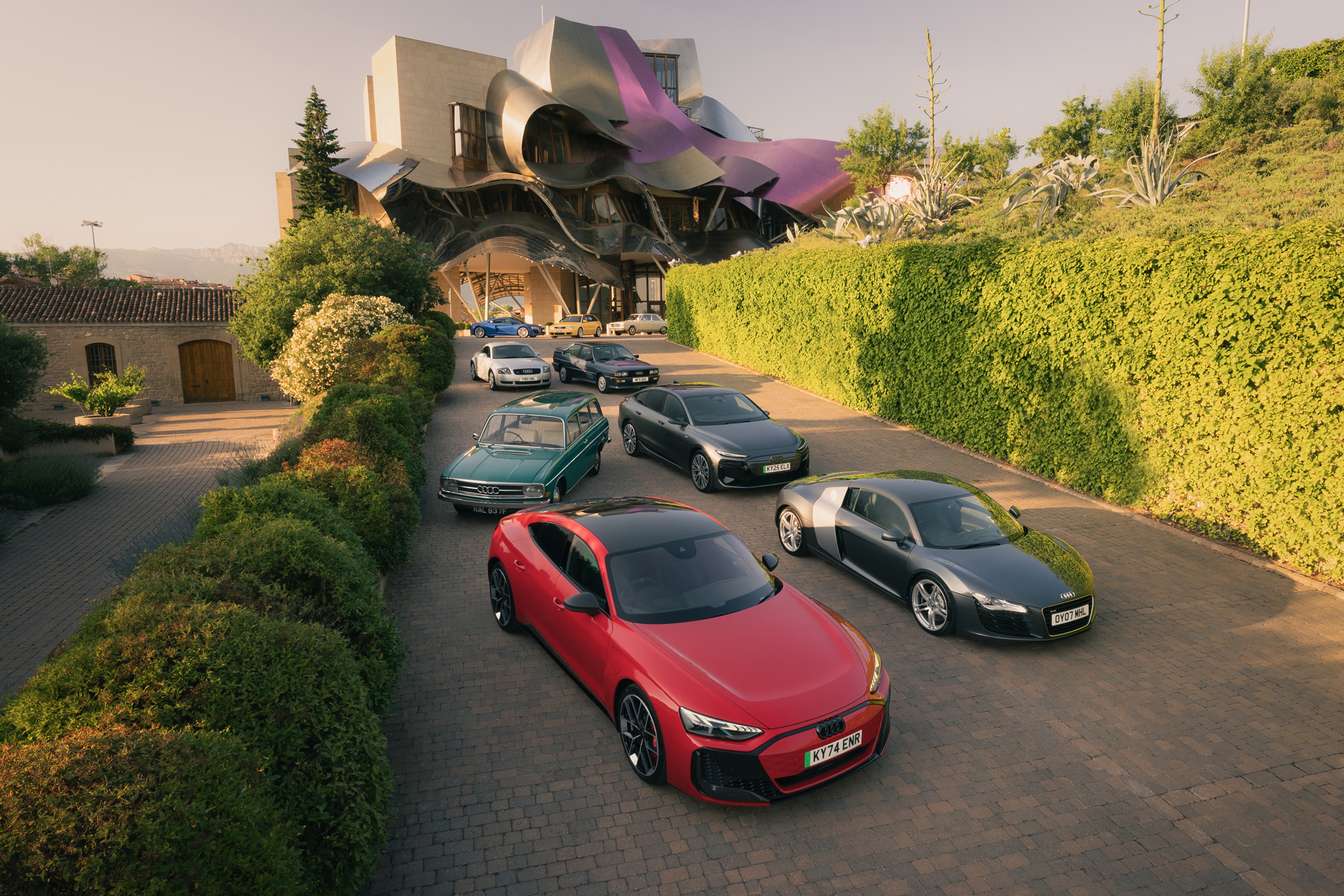 Audis lining a hotel driveway