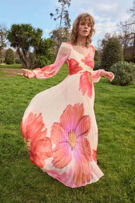 Woman in pink floral dress