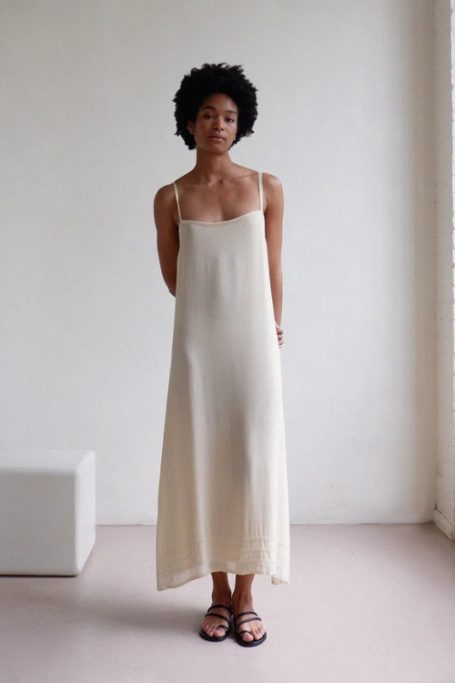 Woman wearing white slip listed on Retold Vintage