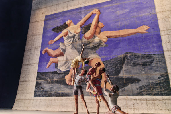Dancers from English National Ballet perform as part of Chanel’s centenary celebrations in front of Picasso’s stage cloth Deux femmes courant sur la plage – created in 1924 for Diaghilev’s Ballets Russes – which is on display at the new V&A East Storehouse