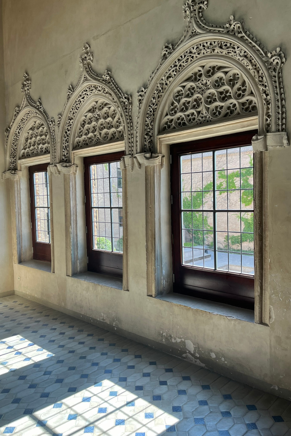 Arched windows with intricate designs