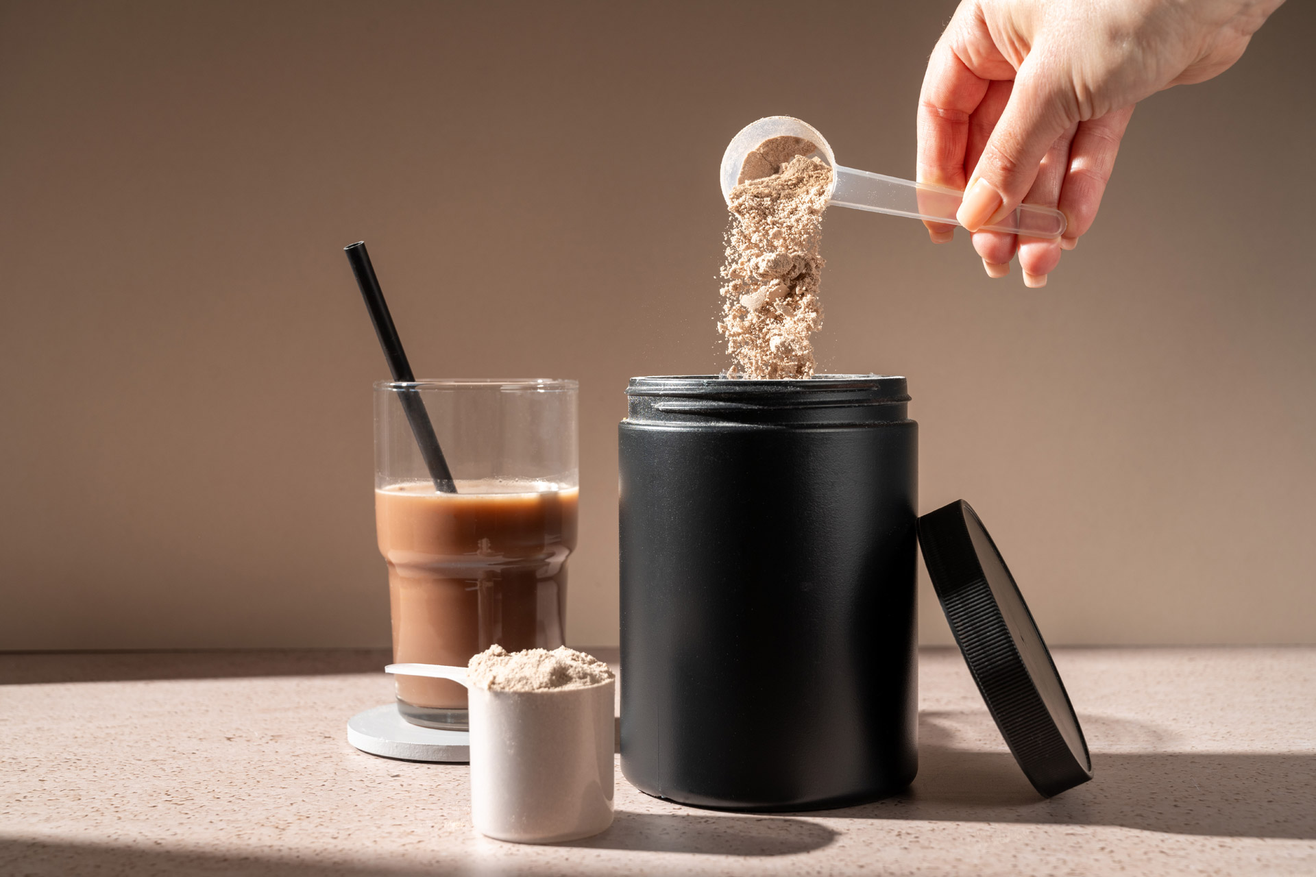 Creatine powder and a protein shake