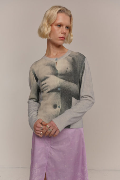 Woman wearing knitted cardigan