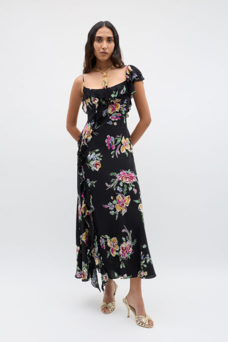 Woman in black floral dress