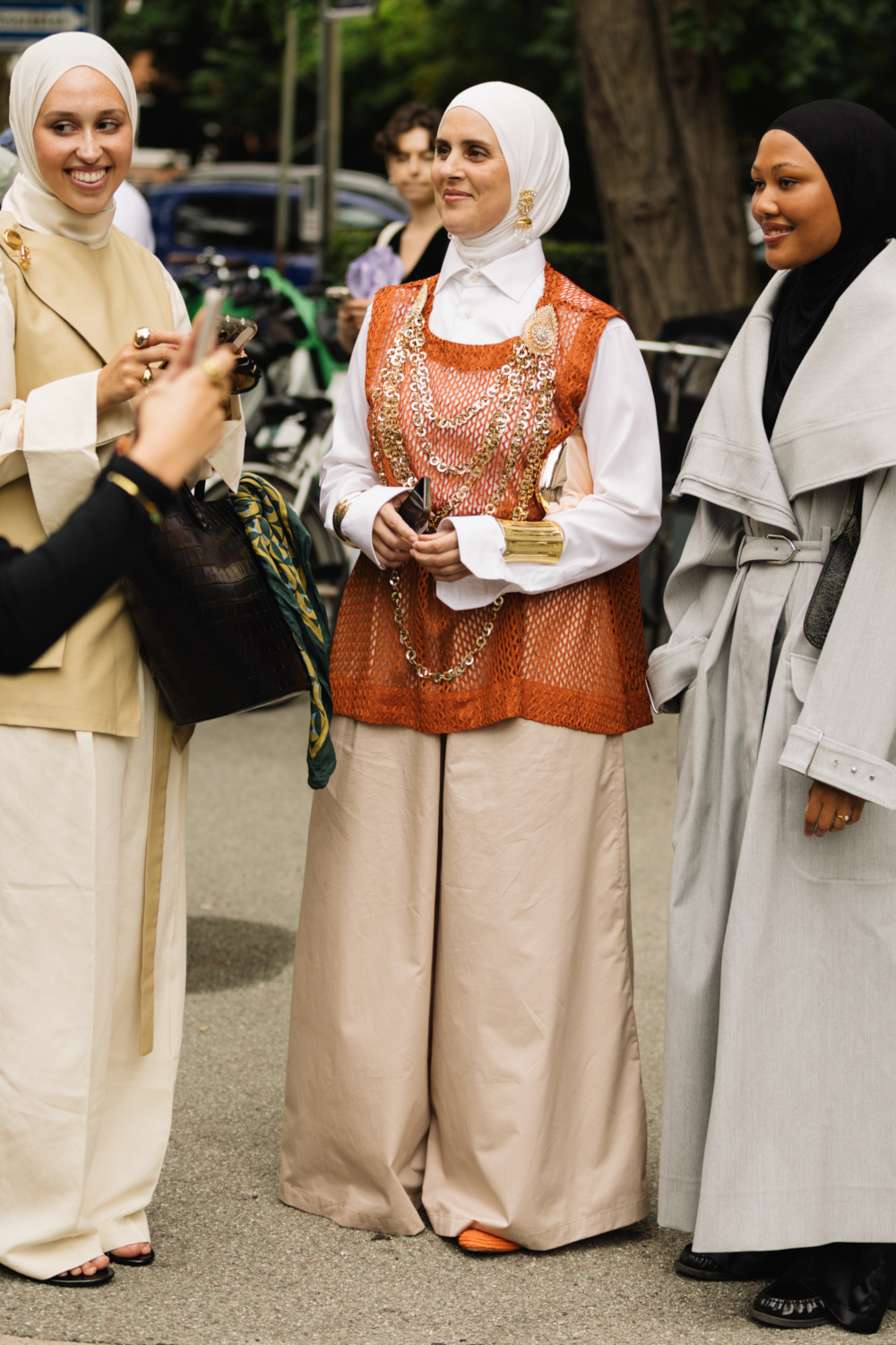 Three women stood together | copenhagen street style