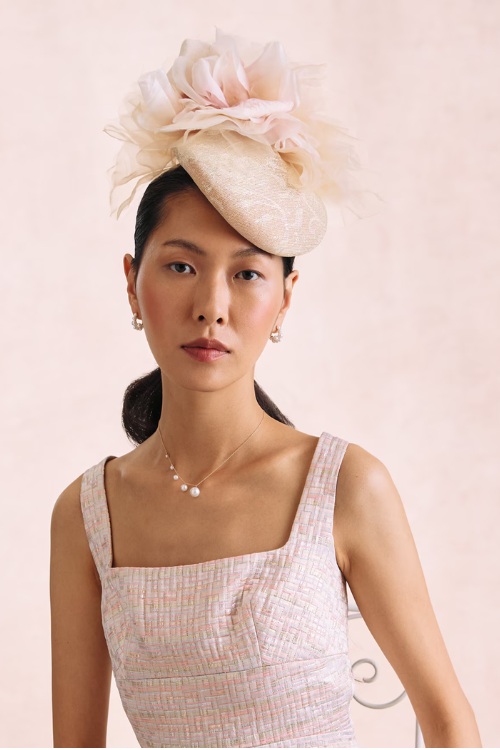 Woman wearing Victoria Grant fascinator