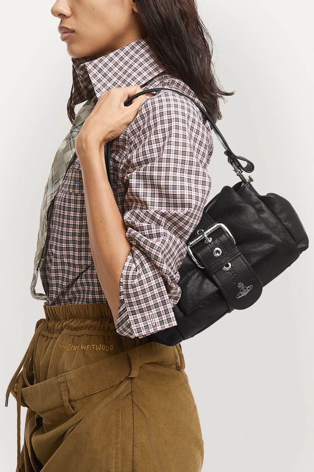Woman holding black bag