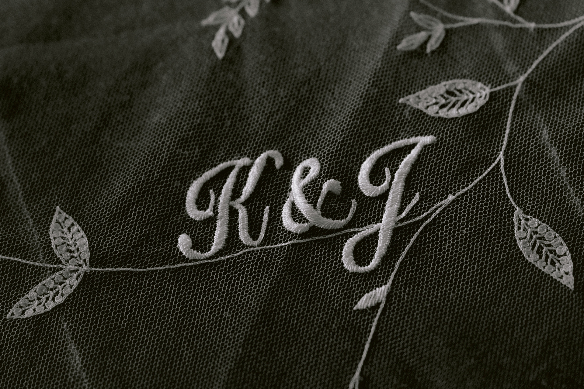 Initials embroidered on veil