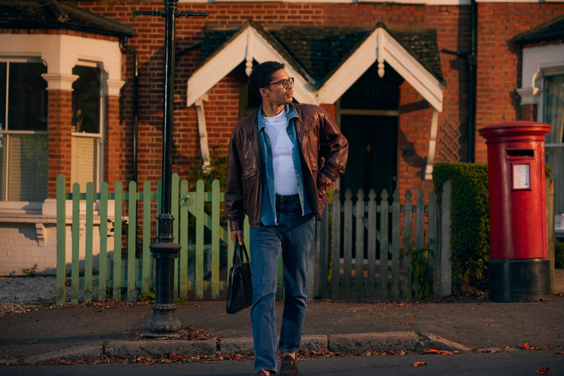 Man walking across road