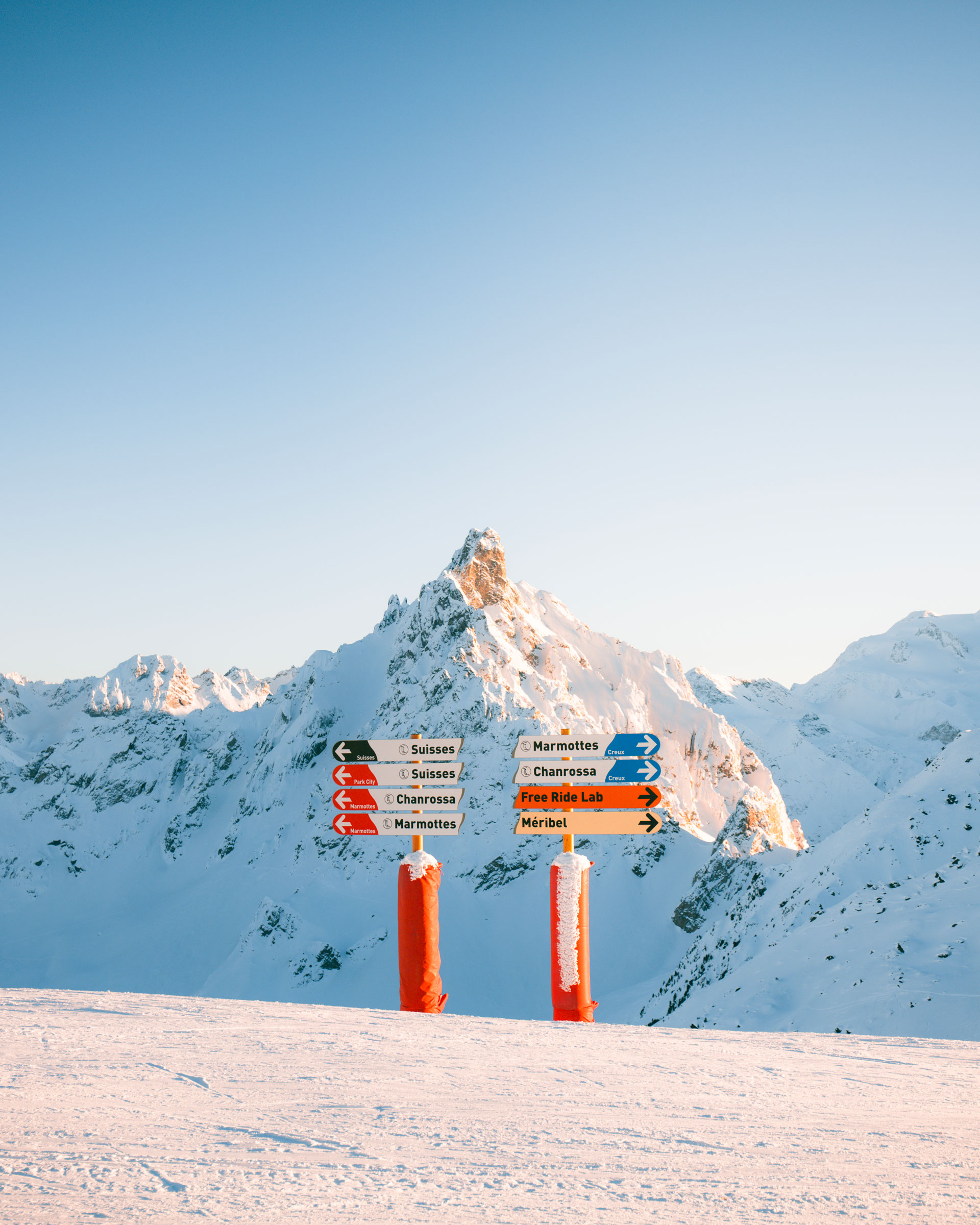 Ski directional signs at the top of Courchevel