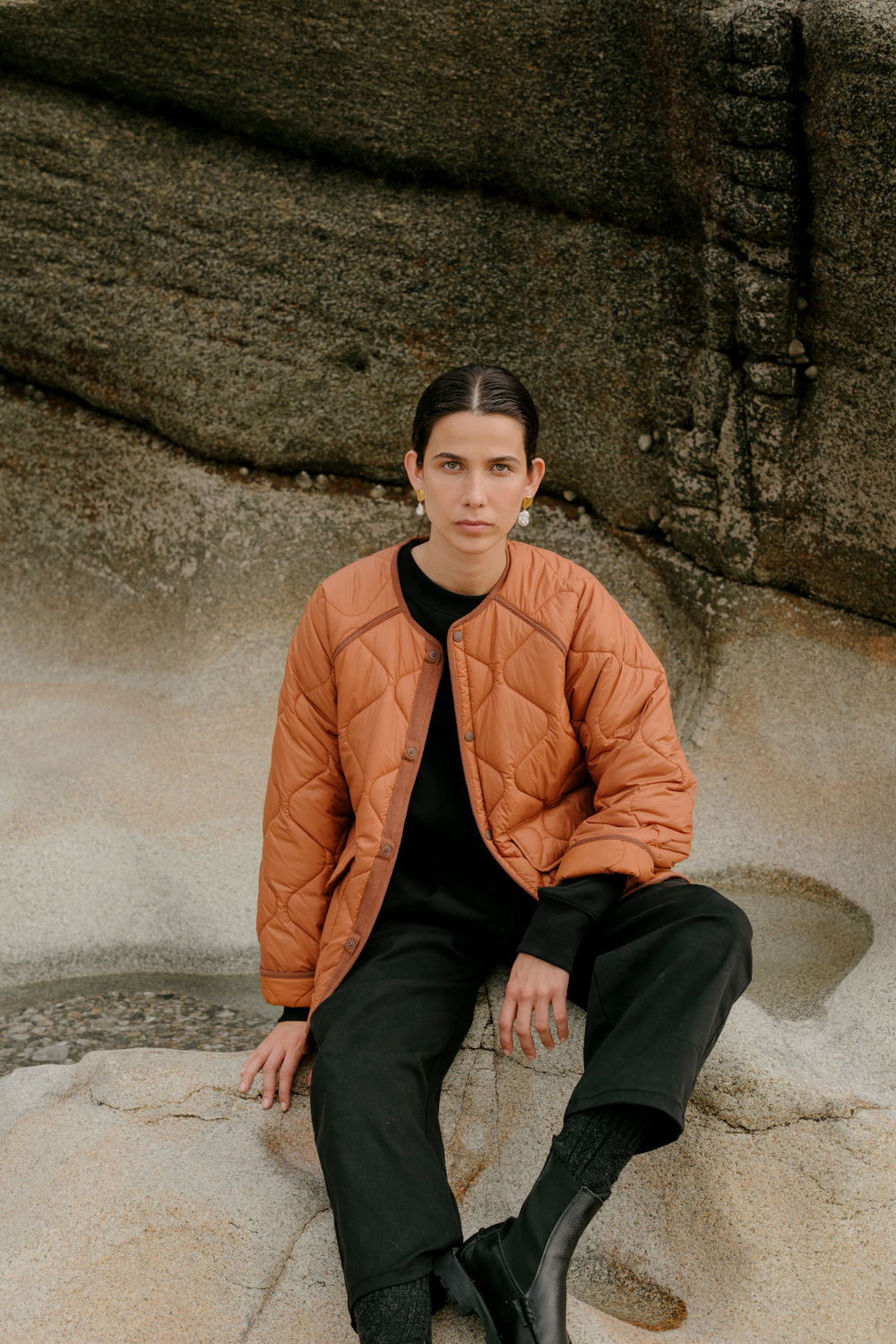Woman in orange coat