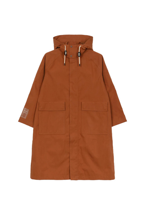 Orange waterproof coat | Finisterre x Amy Powney