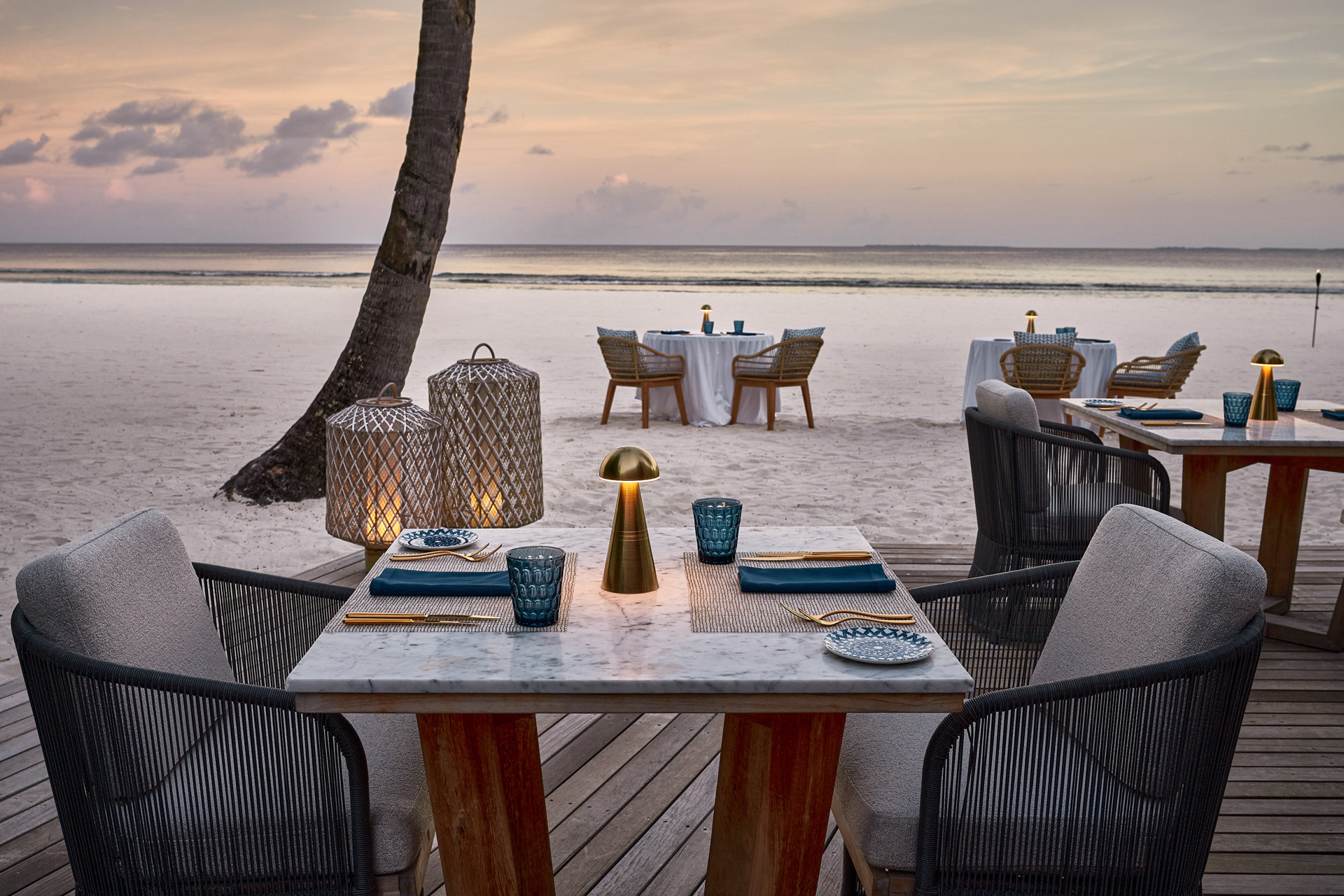 A restaurant by the sea at dusk