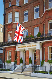 Egerton House Hotel exterior, with big British flag hanging