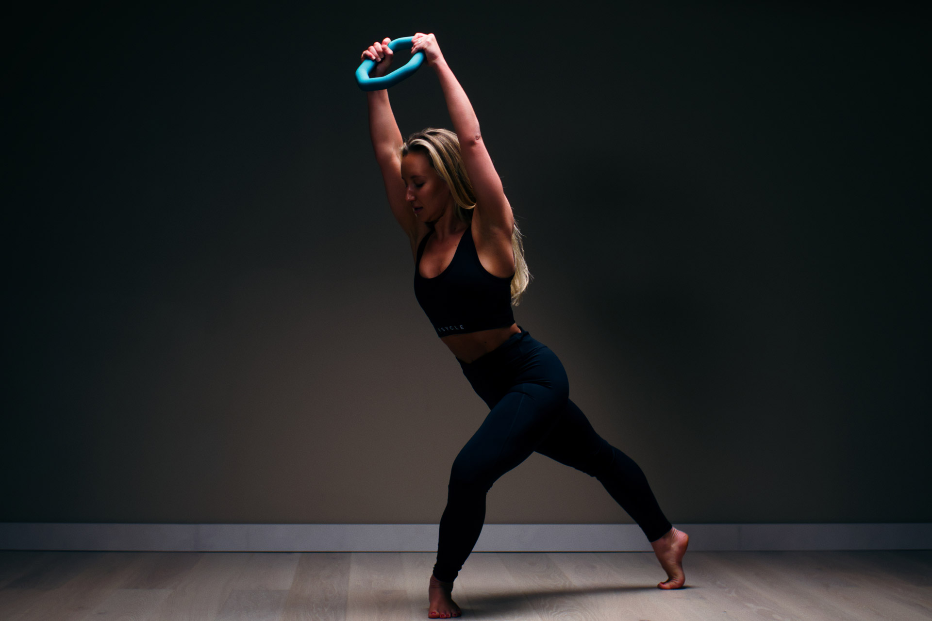 Woman doing a workout class at Psycle in Londno
