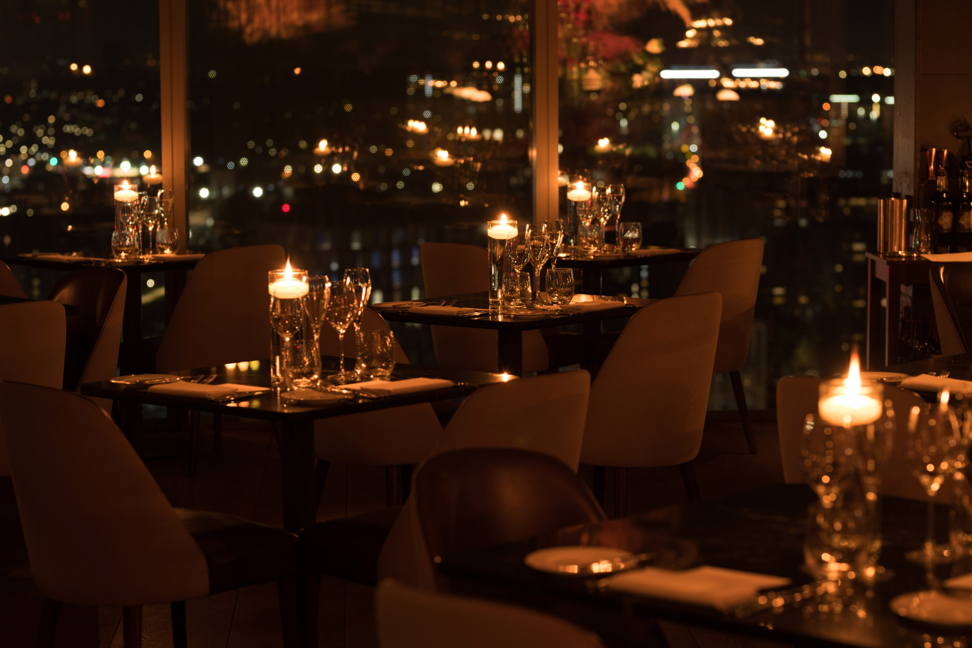 Madison restaurant, lit by candles