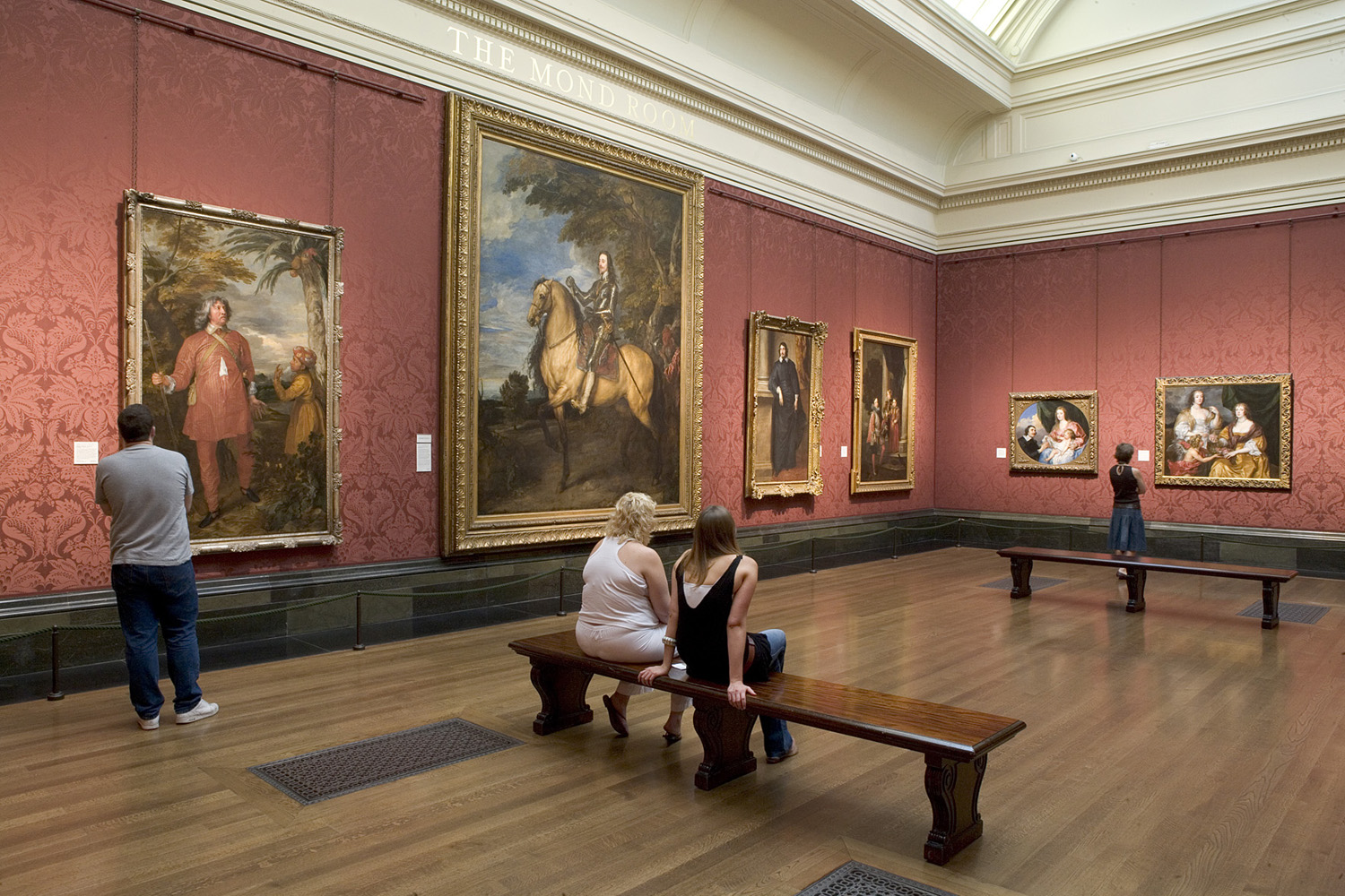 Visitors admiring art in London's National Gallery