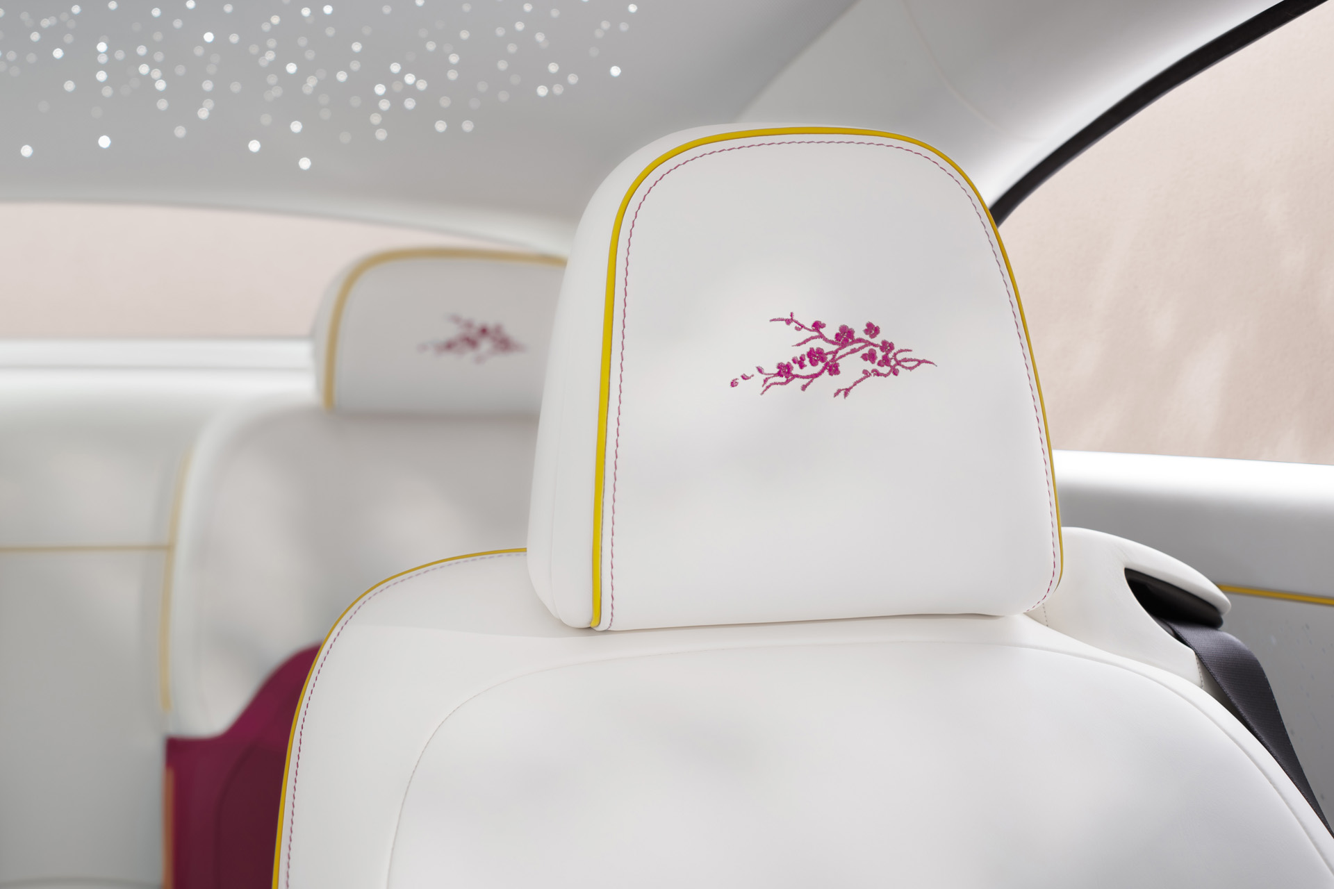 Embroidered head rest