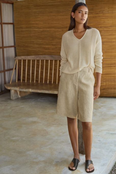 Woman wearing clothes from British knitwear brand Poetry