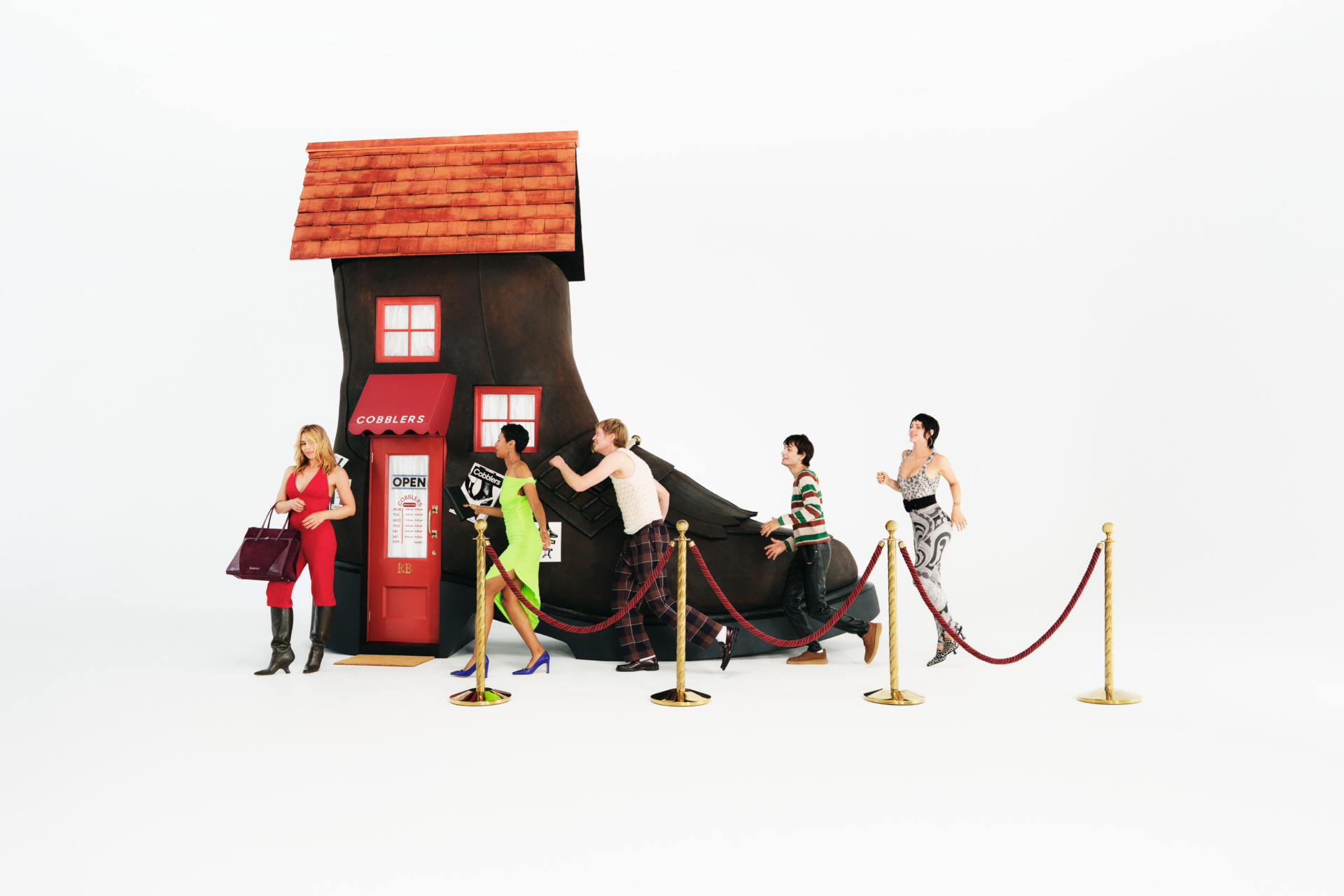 People lining up in front of giant boot