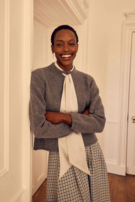 Woman in knitted cardigan