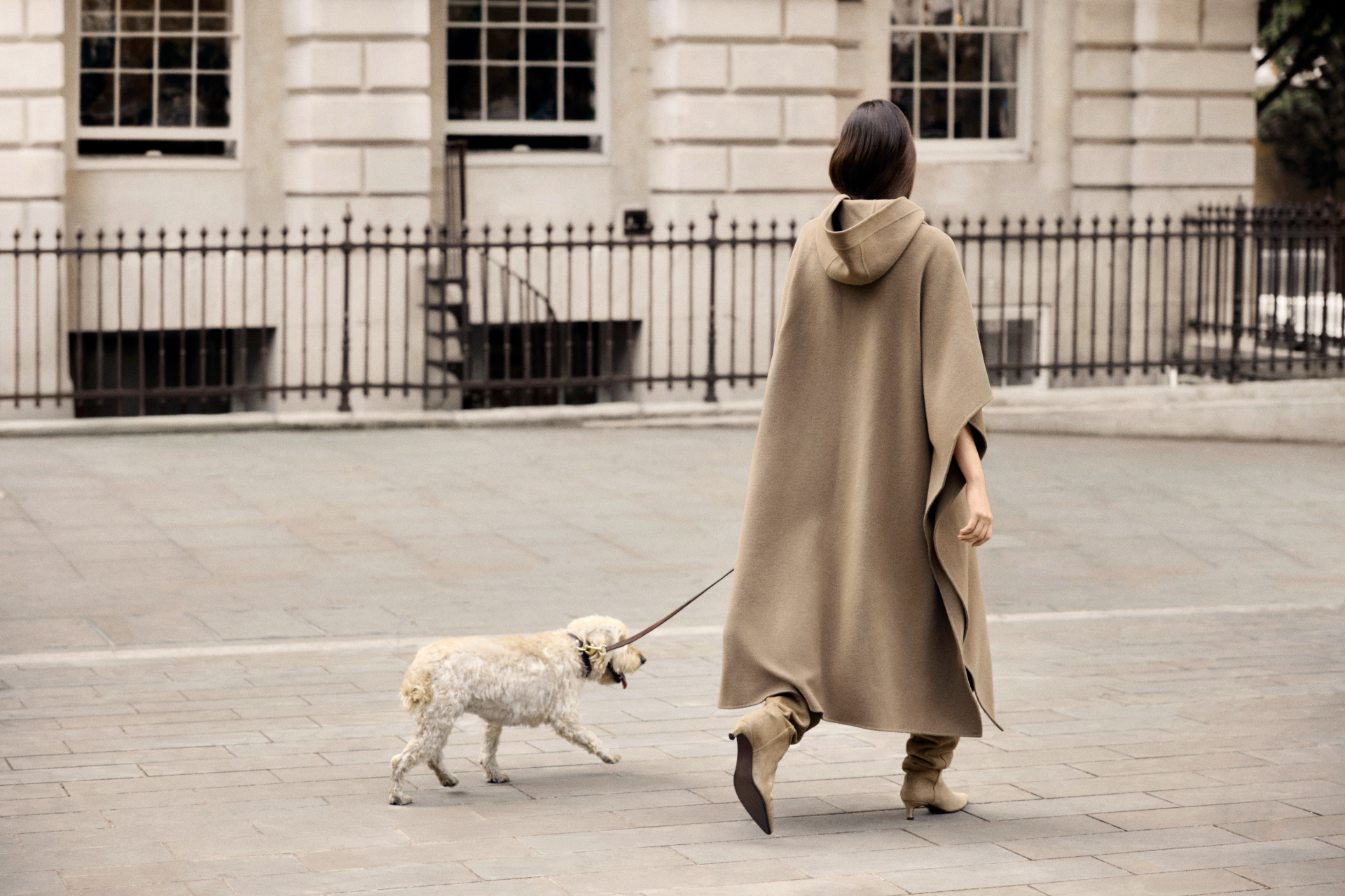 Woman walking dog