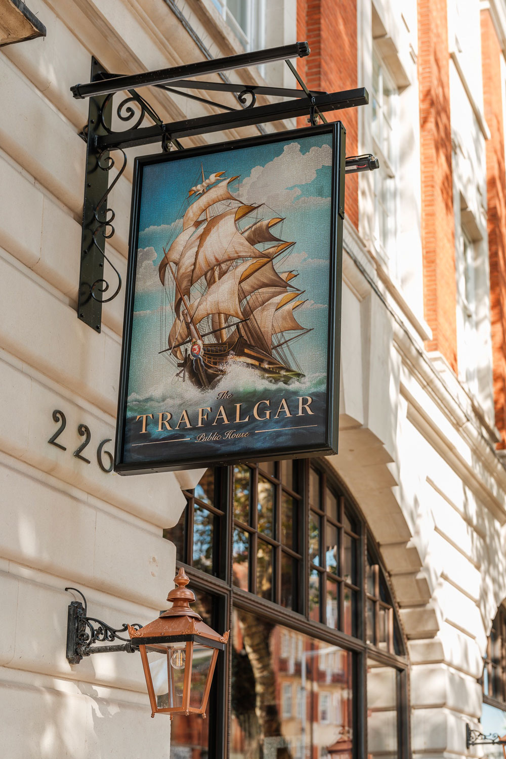 A pub sign with a ship