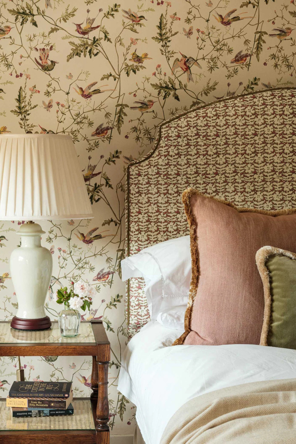 Close up of statement patterned headboard and wall