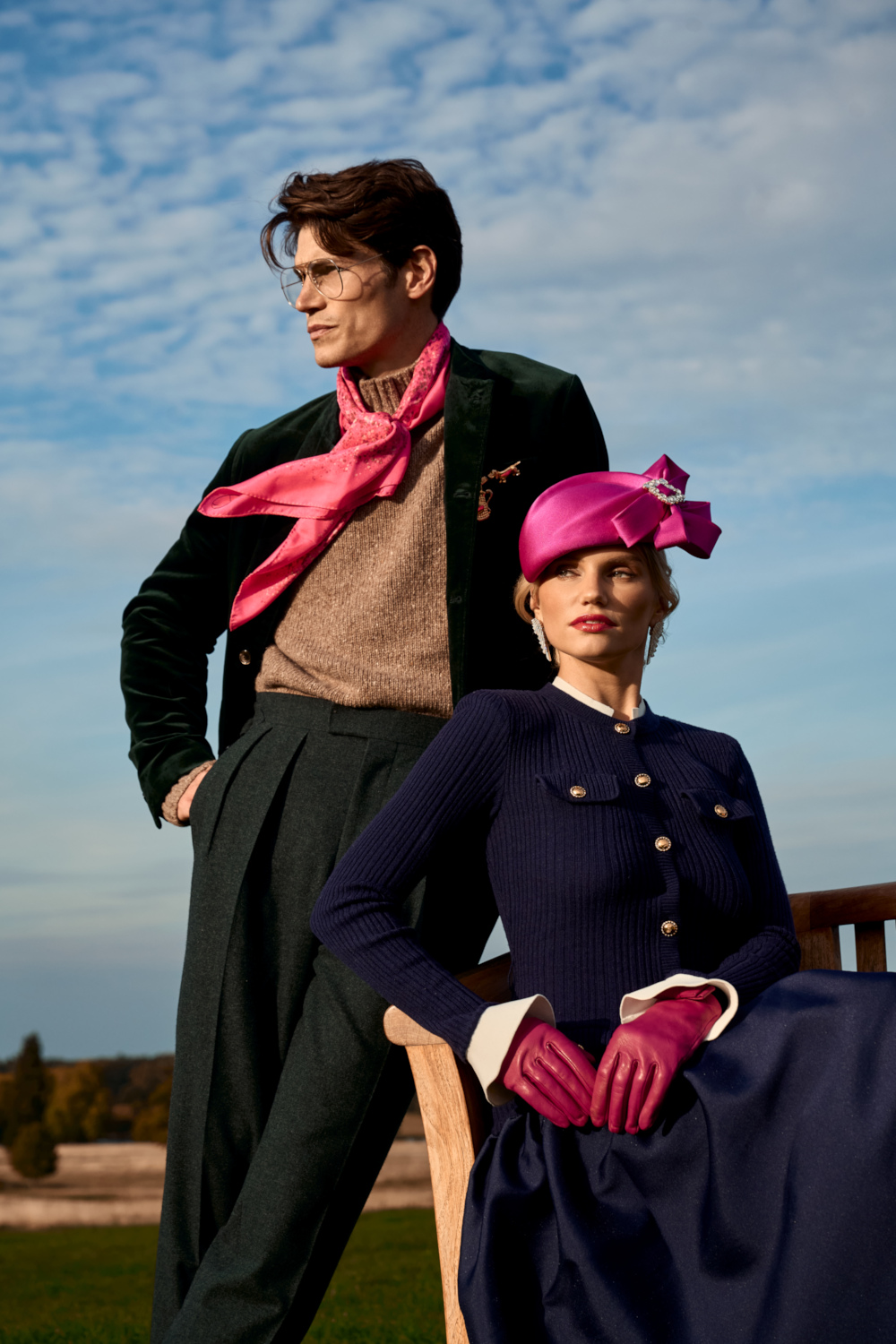 Man and woman in matching pink accessories