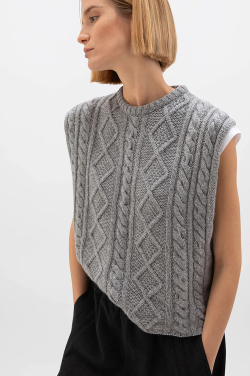 Woman in grey wool tank top