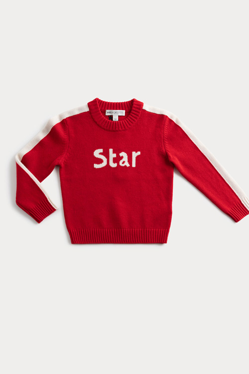 A kid's jumper with 'star' in the middle