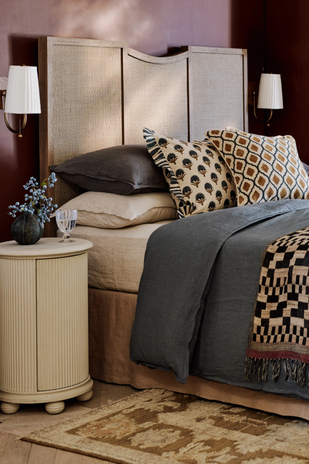 Bed with rattan headboard