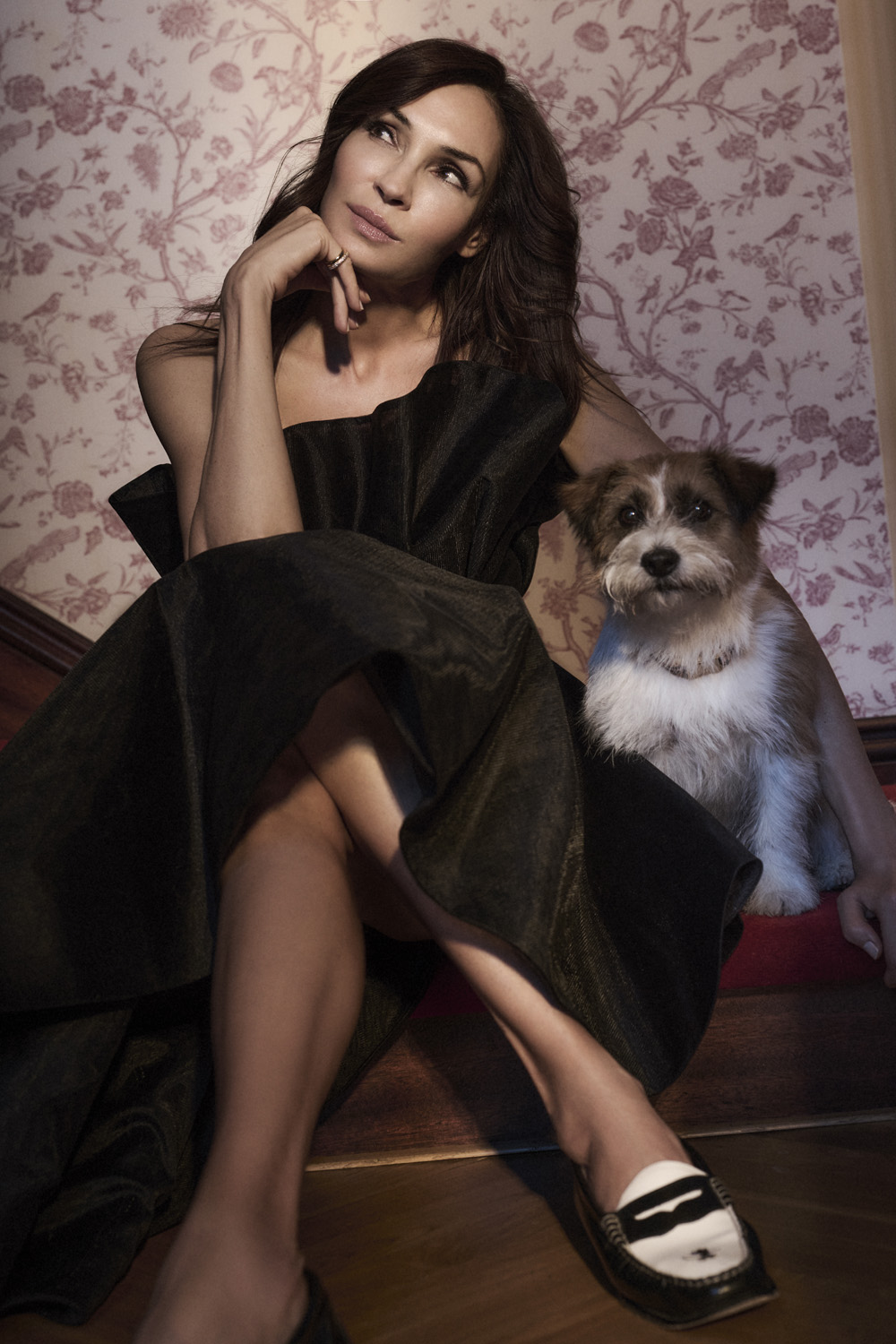 Famke Janssen sat with her dog
