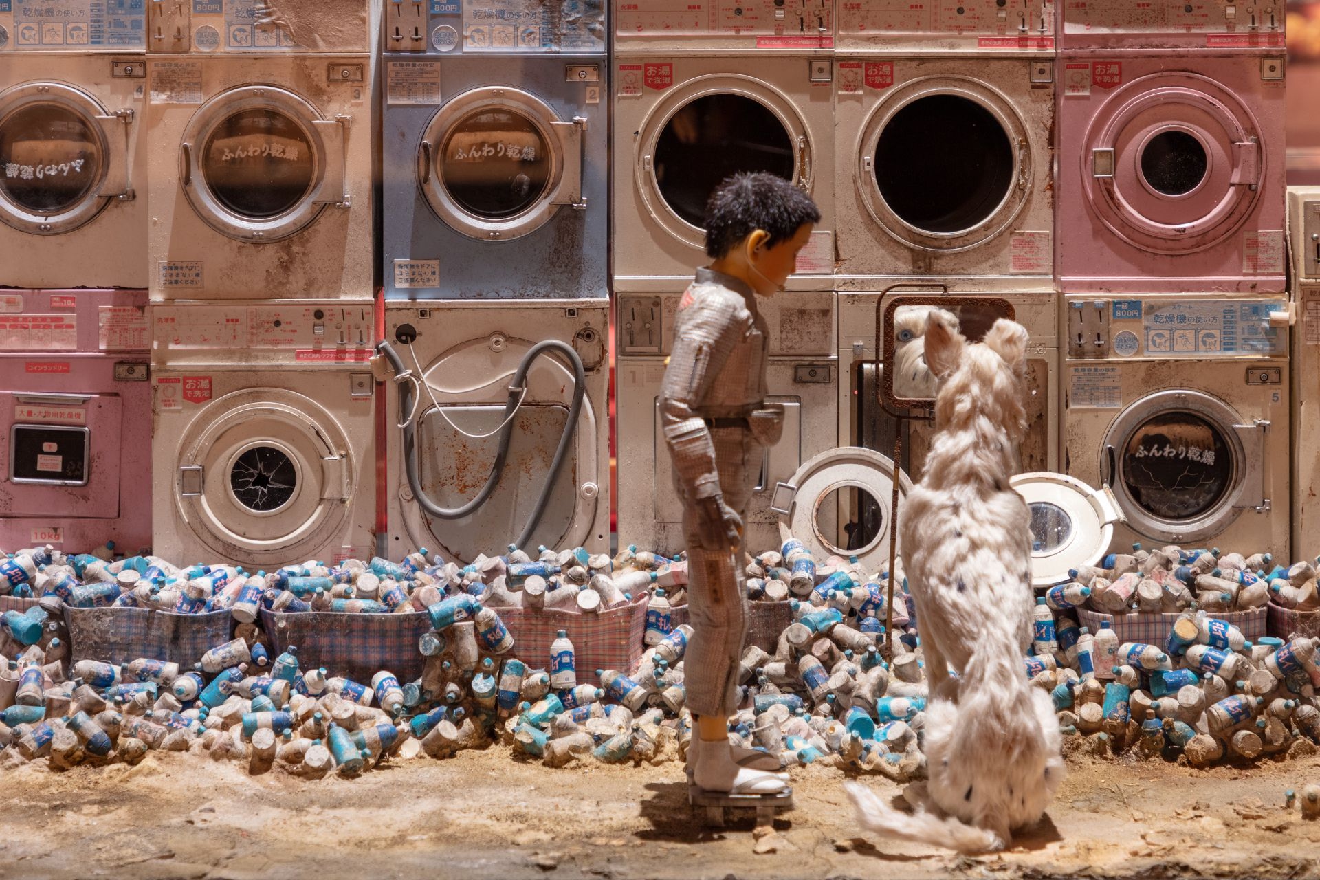 Puppets of a dog and a man from Isle of Dogs film