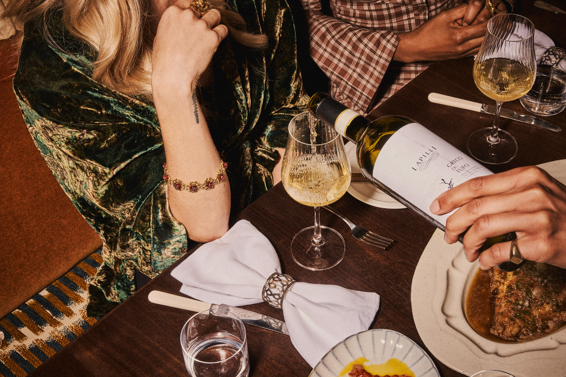 Group of friends having dinner at Julie's restaurant in London