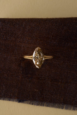 Engagement ring with brown stone