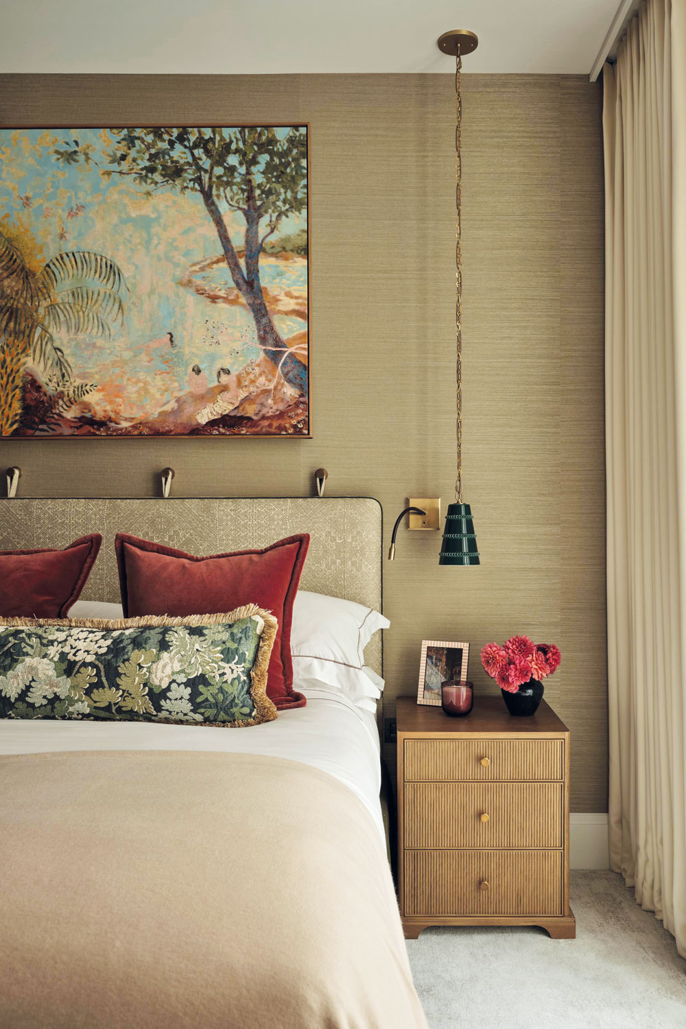 Spare room designed by Rebecca Hughes with long cabled pendant lighting