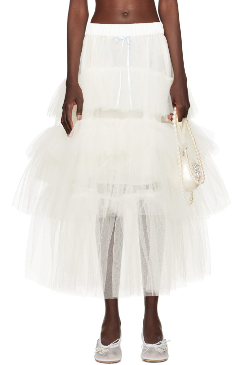 Woman in white tulle skirt