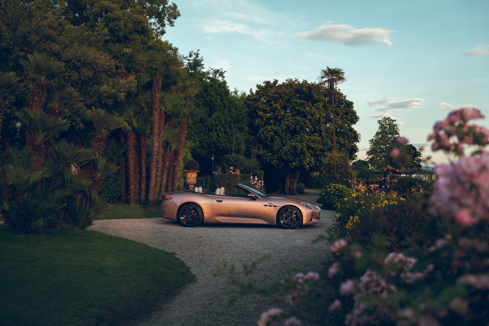 The Maserati GranCabrio Foglore surrounded by lush greenery