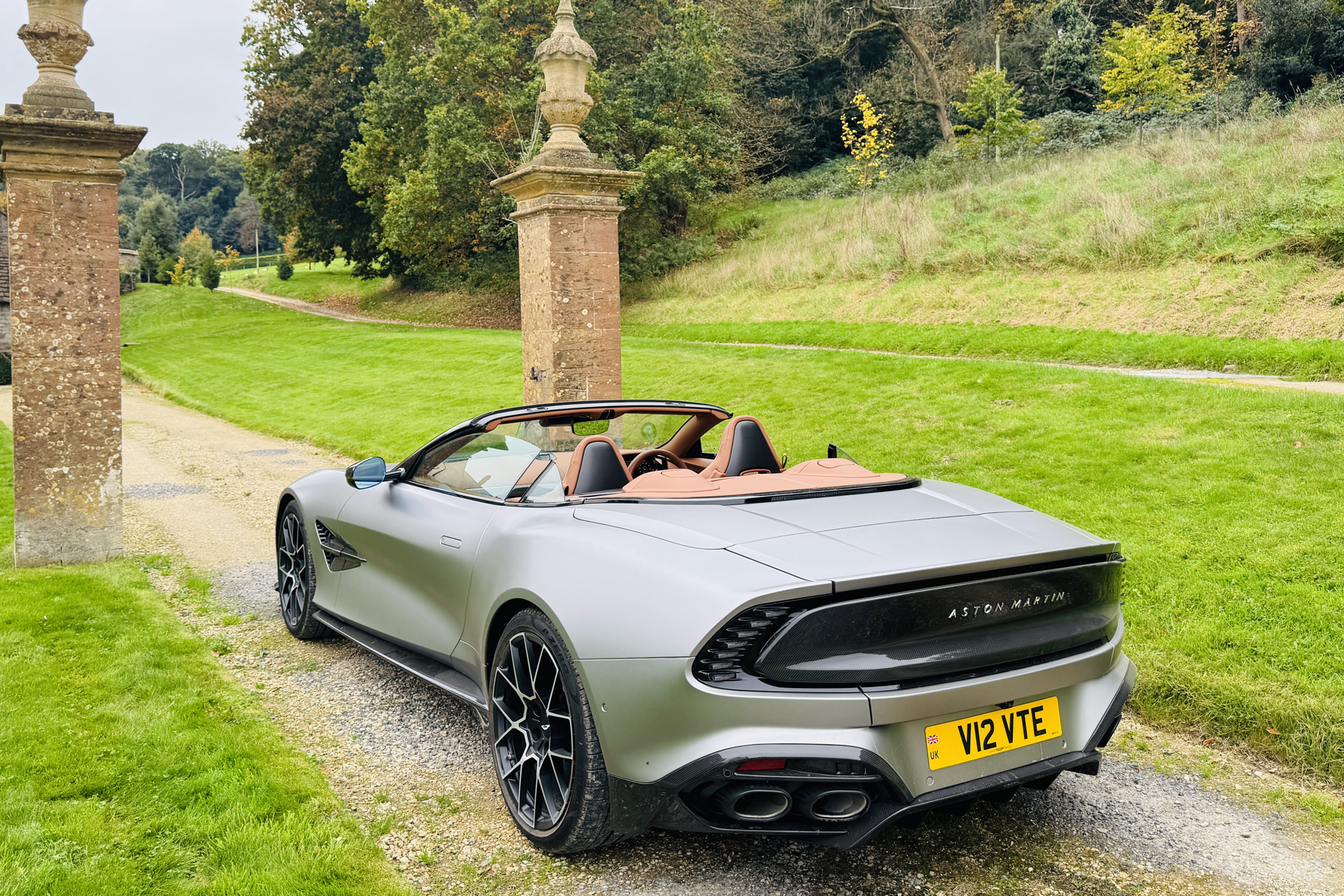 The Aston Martin outside Newton Surmaville