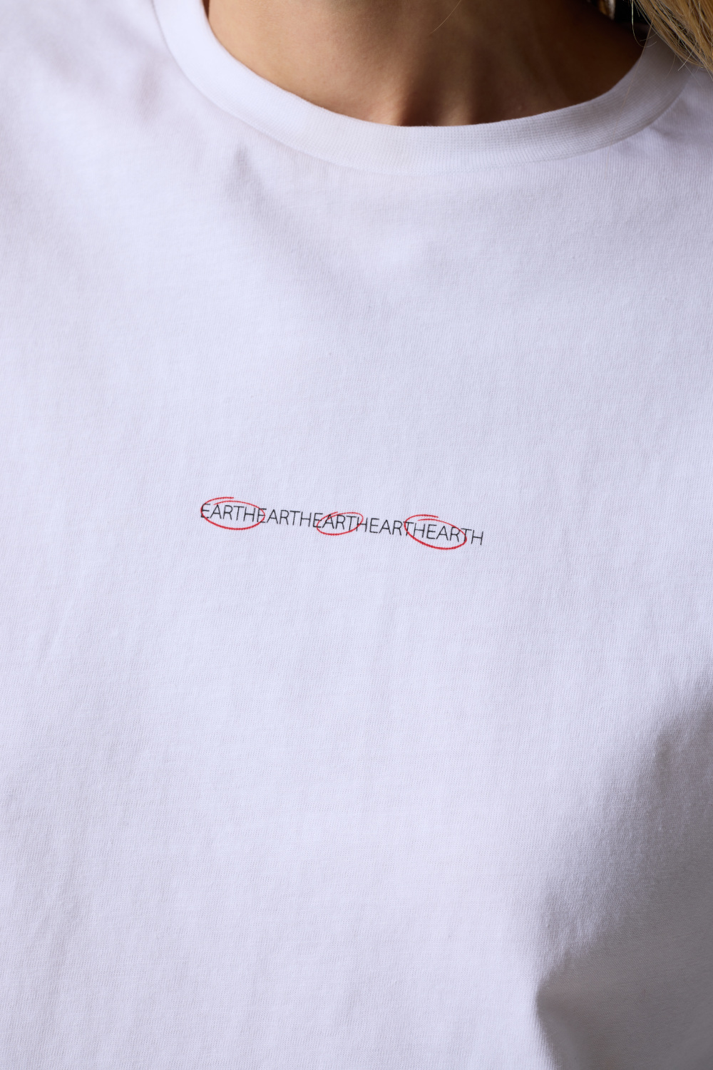 Close up of white t-shirt with red writing