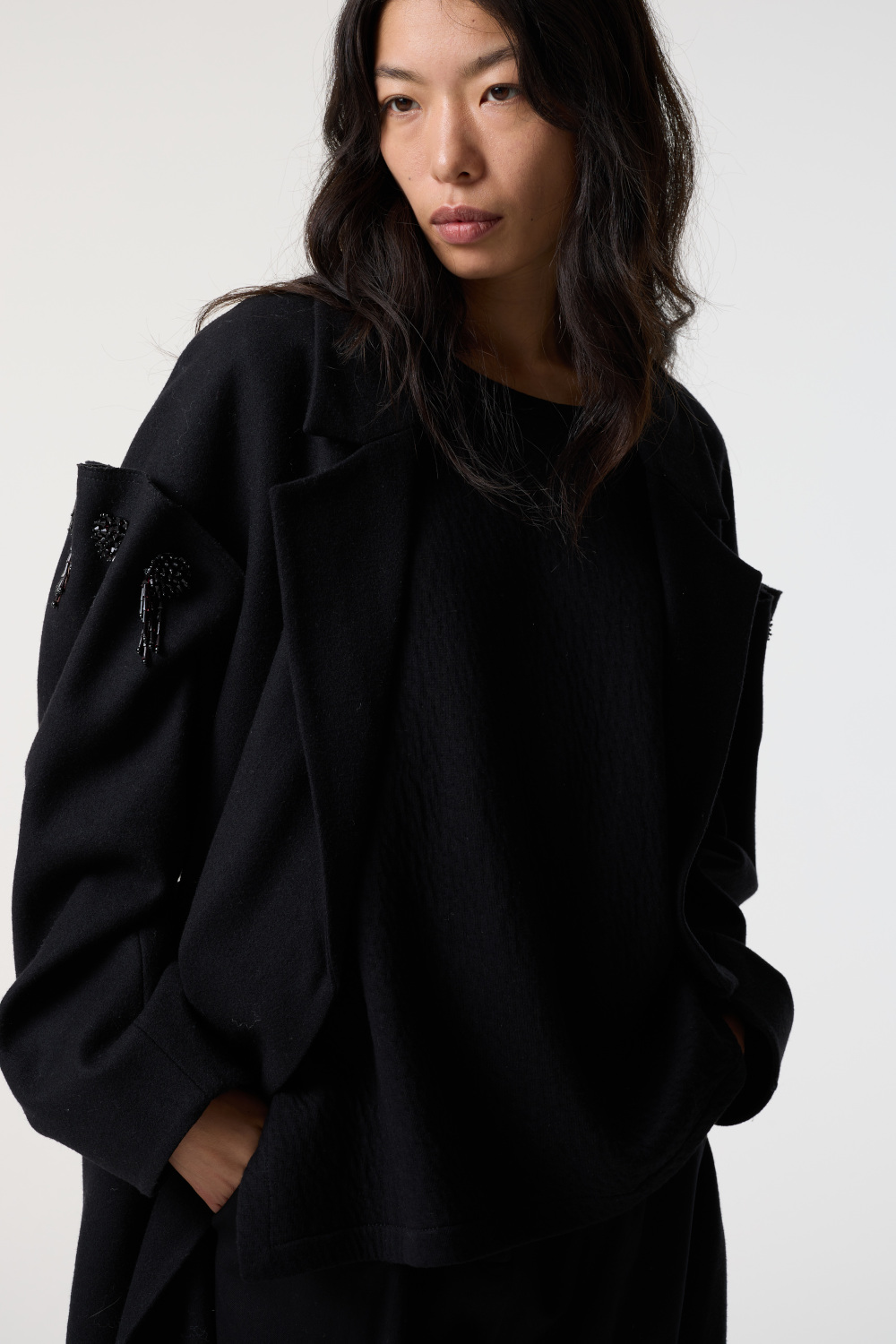 Woman in black jumper