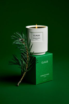 Candle on green box and background