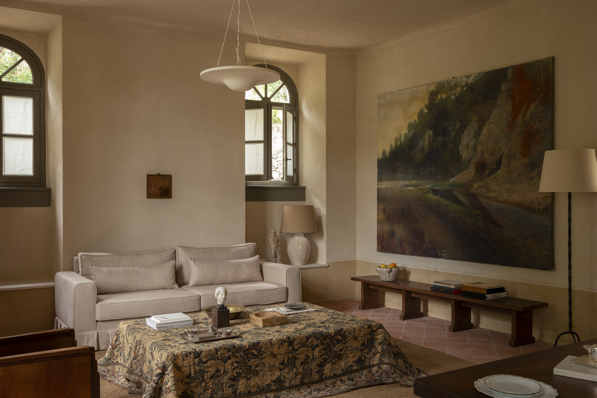 A bedroom in a restored convent with thematic furniture