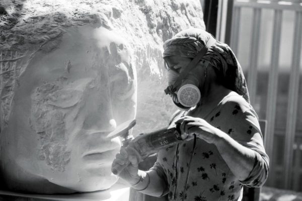 Emily Young carving a sculpture