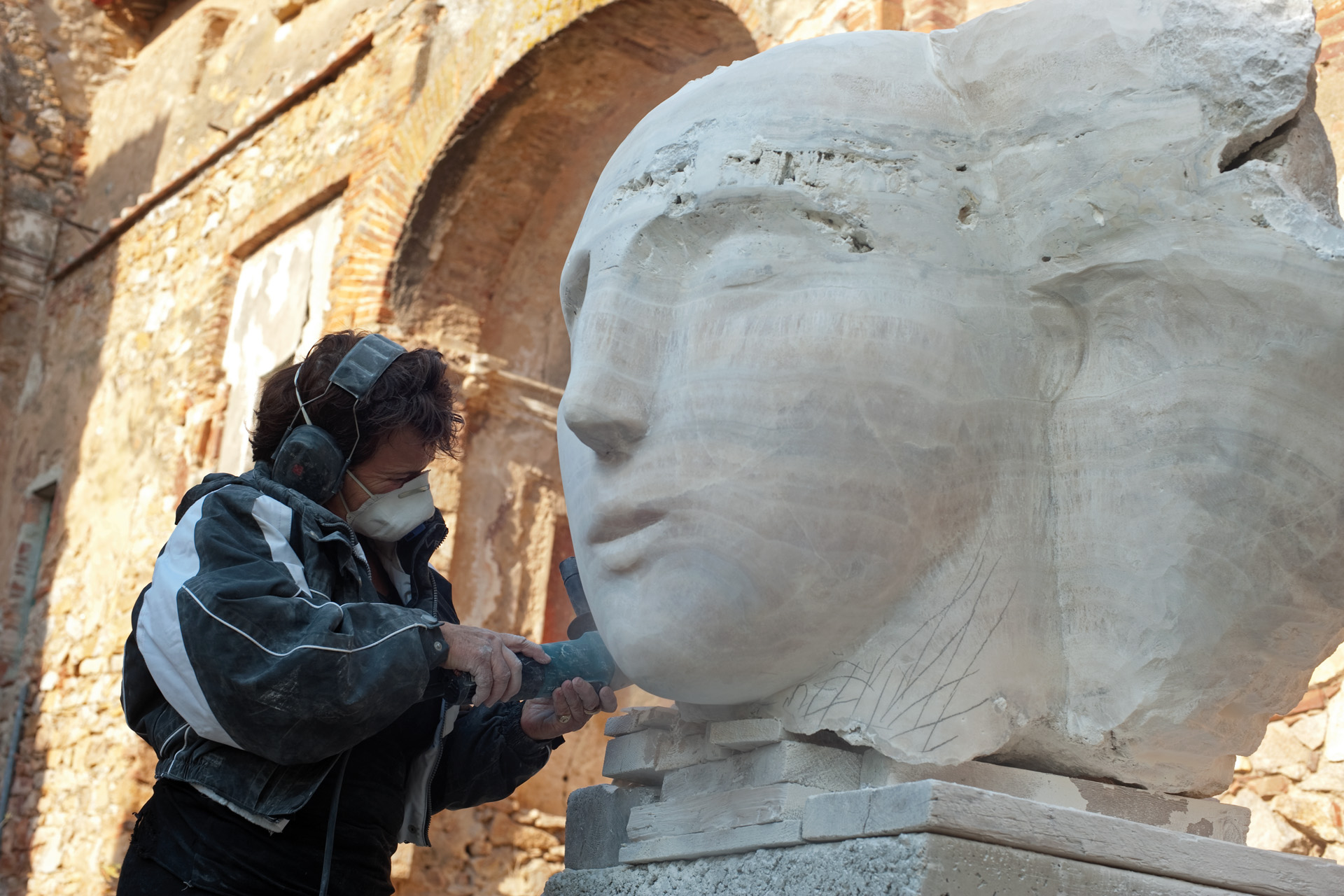 Emily Young carving a sculpture