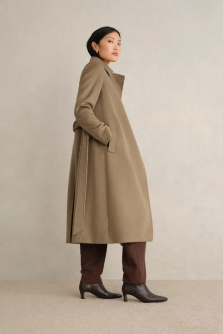Woman wearing brown coat