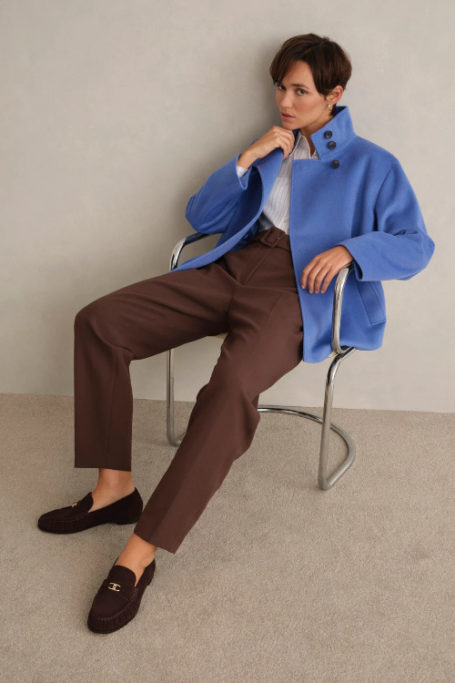 Woman wearing blue jacket